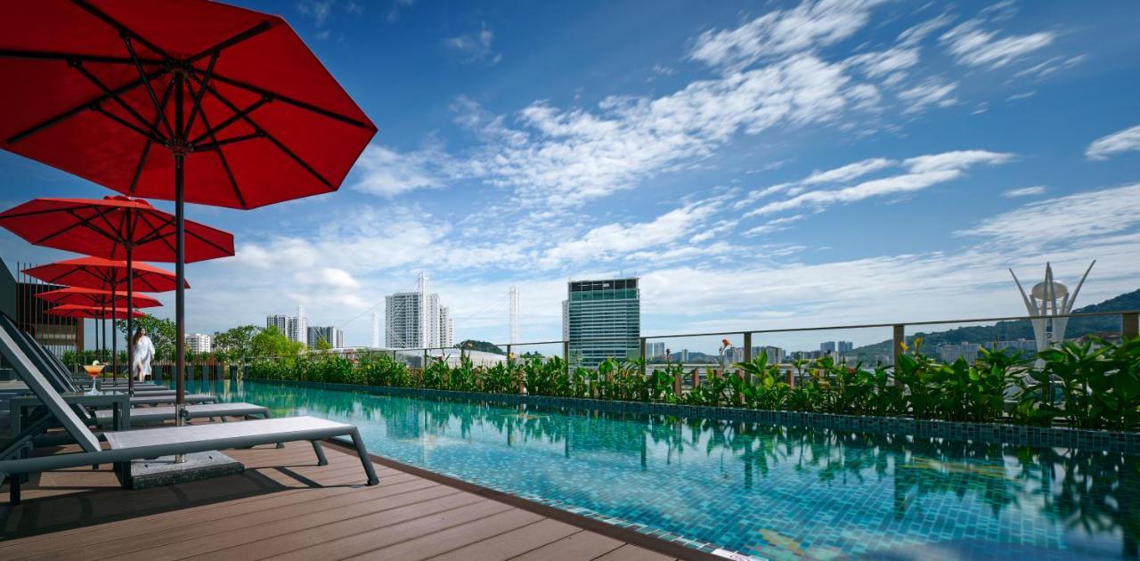 Amari Spice Penang Hotel Bayan Lepas Exterior photo The swimming pool at the rooftop