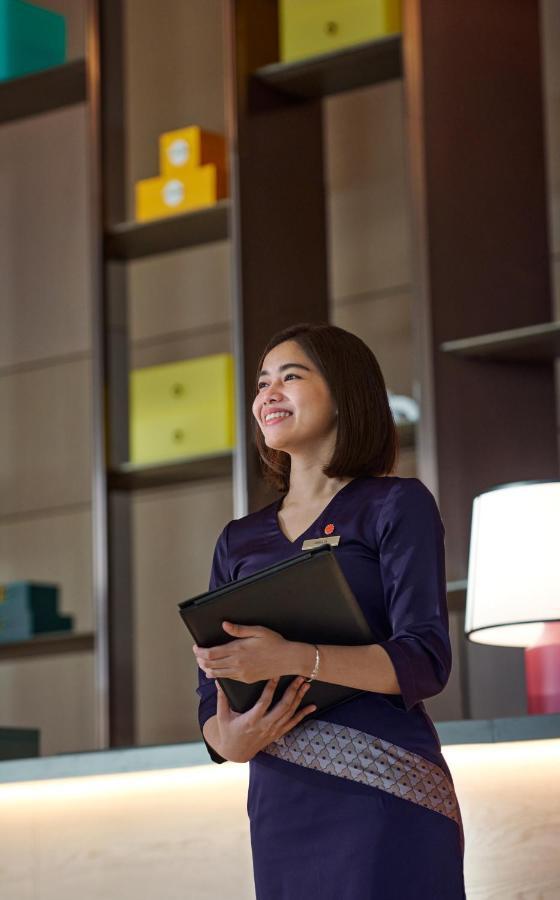 Amari Spice Penang Hotel Bayan Lepas Exterior photo A student at the library